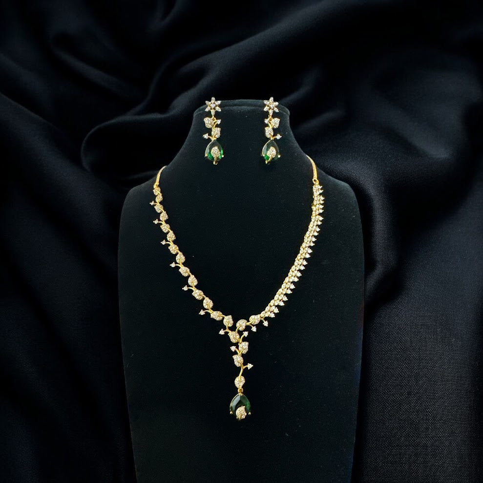 Delicate AD Necklae Set with Tear Drop Green Stone in Gold Finish