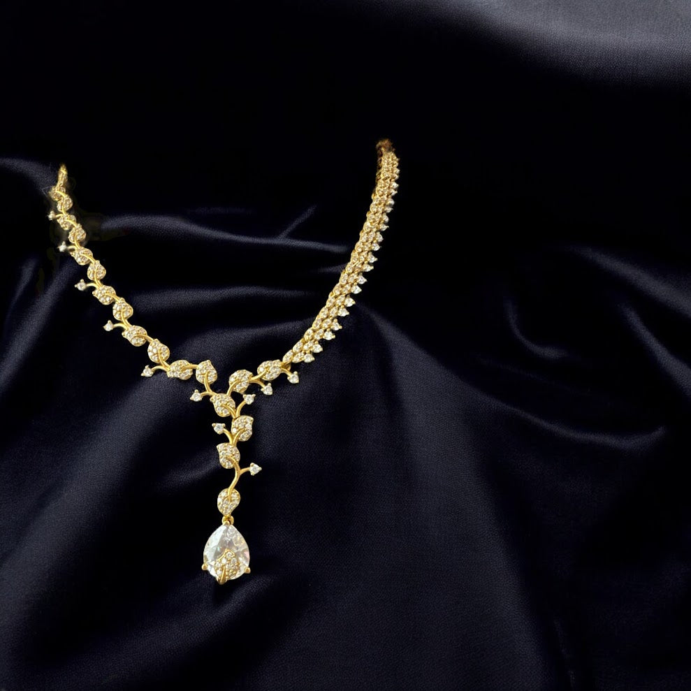 Delicate AD Necklae Set with Tear Drop Stone in Gold Finish