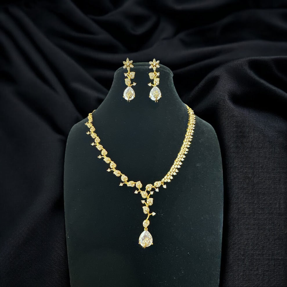 Delicate AD Necklae Set with Tear Drop Stone in Gold Finish