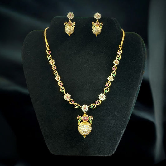 Luxurious Design NecklaceSet in Gold Finish with a Touch of Pink and Green Detailing