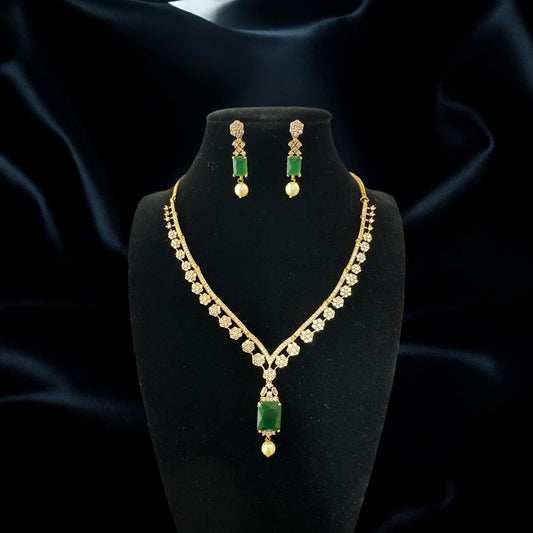 Graceful AD Necklace Set in Gold Finish with Emerald Square Drop