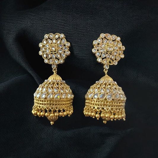 Timeless Reversed AD Jhumka in Gold Finish