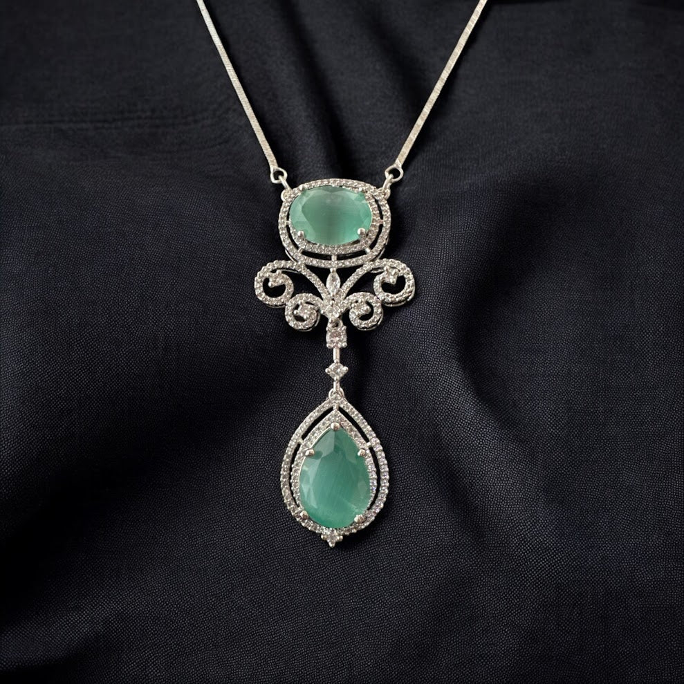 Glamorous Pendant Set with Pastel Green Stone in Silver Finish