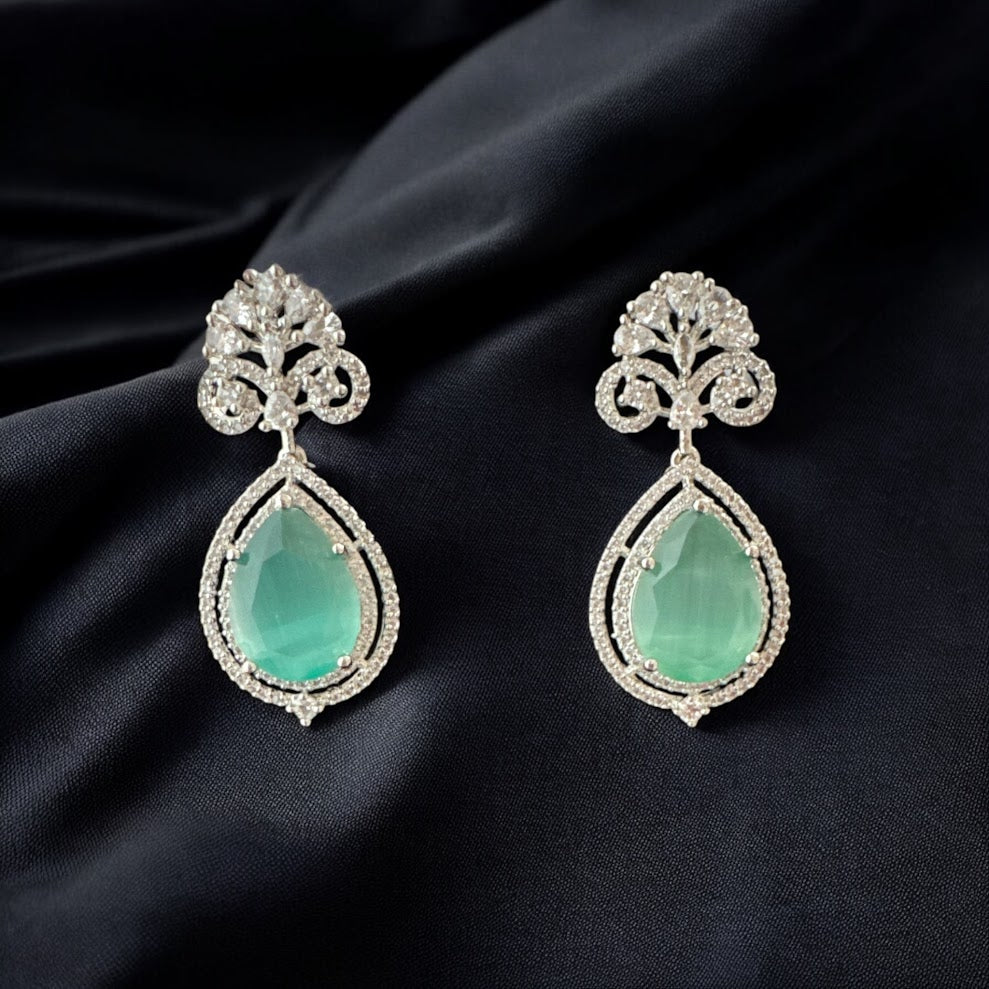 Glamorous Pendant Set with Pastel Green Stone in Silver Finish