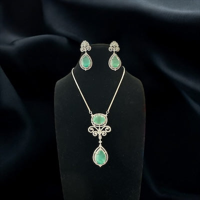 Glamorous Pendant Set with Pastel Green Stone in Silver Finish