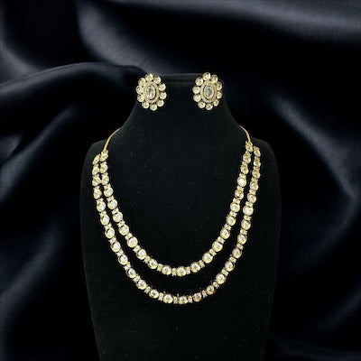 Trendy Double LayerTyaani Kundan and AD Necklace Set