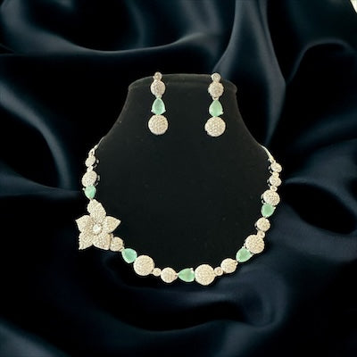 Glamorous Nano Setting Necklace Set in Silver Finish with Pastel Green Stone