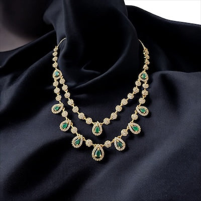 Stylist Double Layered AD Necklace Set in Gold Finish with Green Stone