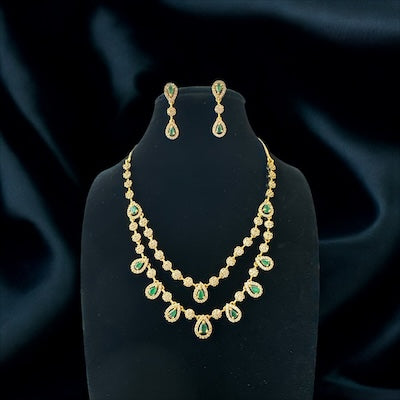 Stylist Double Layered AD Necklace Set in Gold Finish with Green Stone